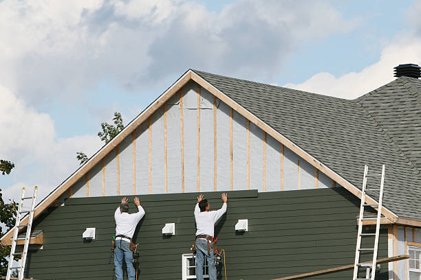 Professional Siding Installation technician working in Roseville, OH